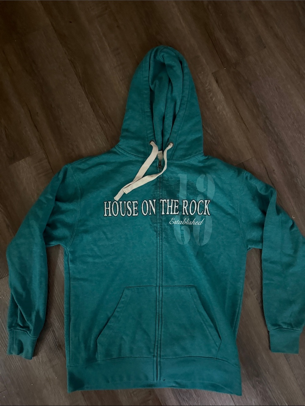 teal zip up
